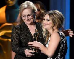 She is the goddaughter of Meryl Streep where Writer Bruce Wagner is her godfather.